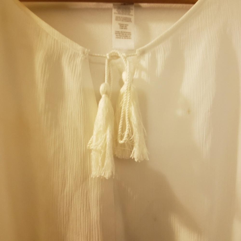 white dress with bell sleeves